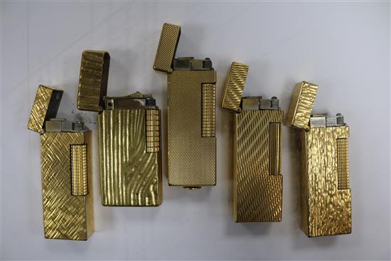 Five assorted Dunhill cigarette lighters